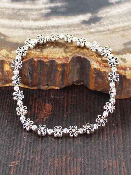 SP105F ELASTICATED FLOWER BRACELET [SILVER PLATE]