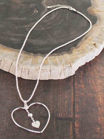 SP205 OPEN HEART PENDANT NECKLACE WITH DROP CHARMS {SILVER-PLATE]